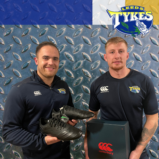 Men of Steel, Ben Dixon and Matt Burke with a pair of Phoenix Genesis Elite rugby boots from Tykes' partner Canterbury  