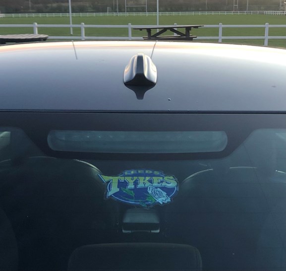 Car with Leeds Tykes sticker in the rear window
