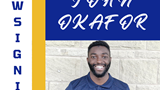 New signing John Okafor, Leeds Tykes logo and picture of John